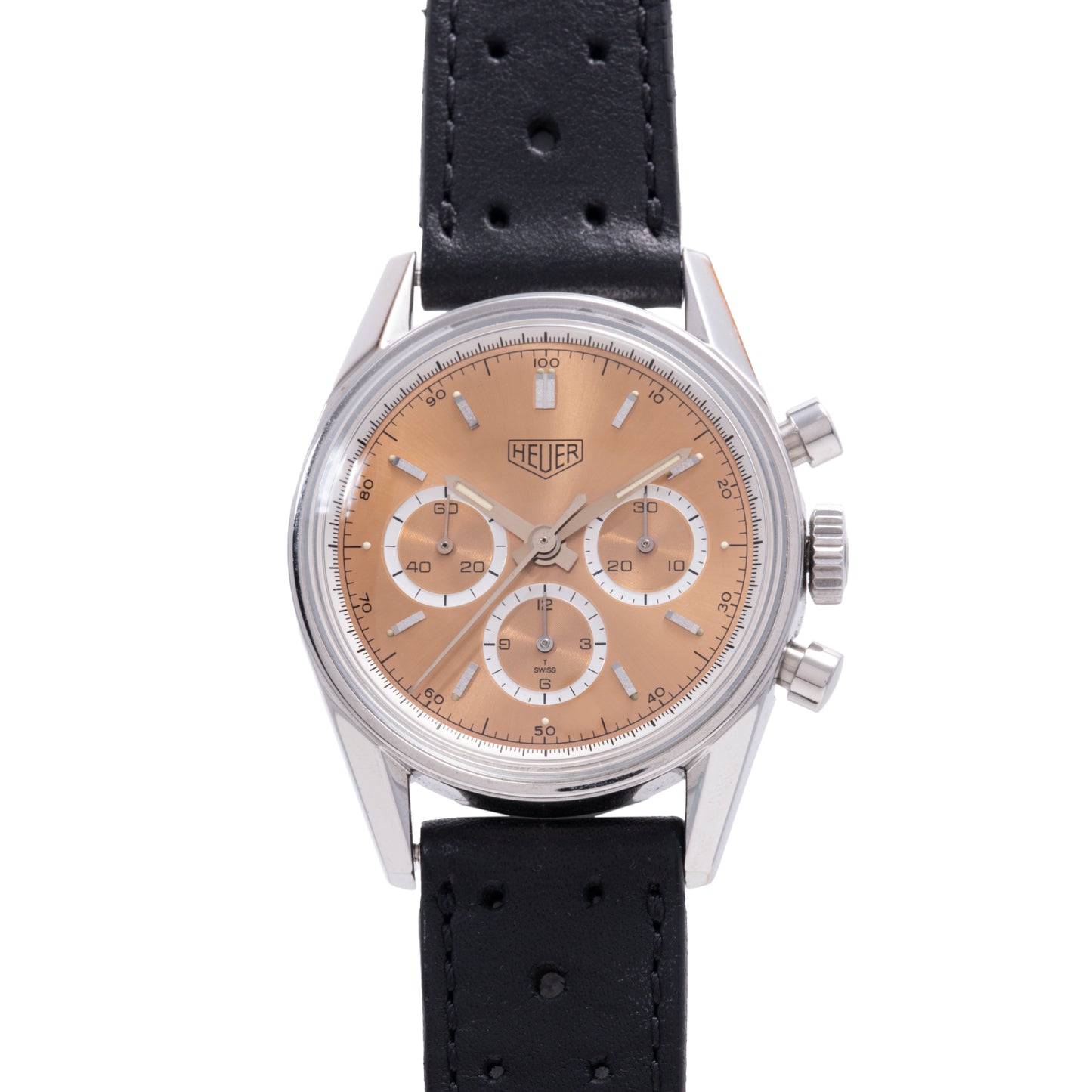 The TAG Heuer 1964 Carrera Re-Edition features a tan dial, three subdials, a silver case, and a black perforated leather strap. This TAG Heuer chronograph includes two side buttons and a crown for classic functionality.