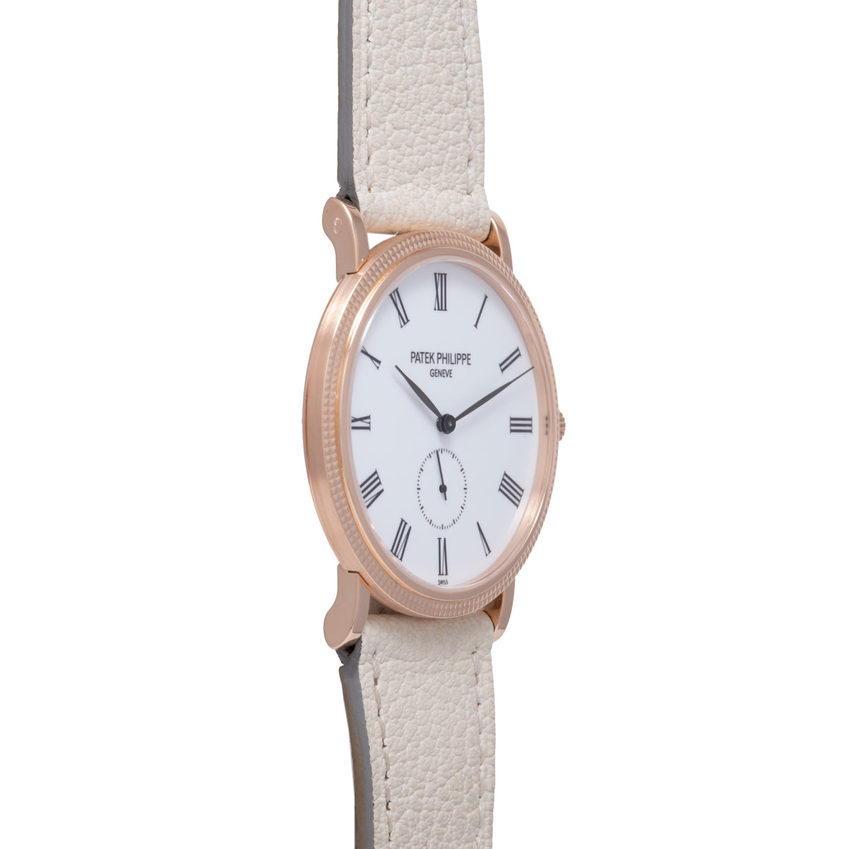 Rose gold oval watch with white dial, Roman numeral markers, subdial, and cream leather strap.