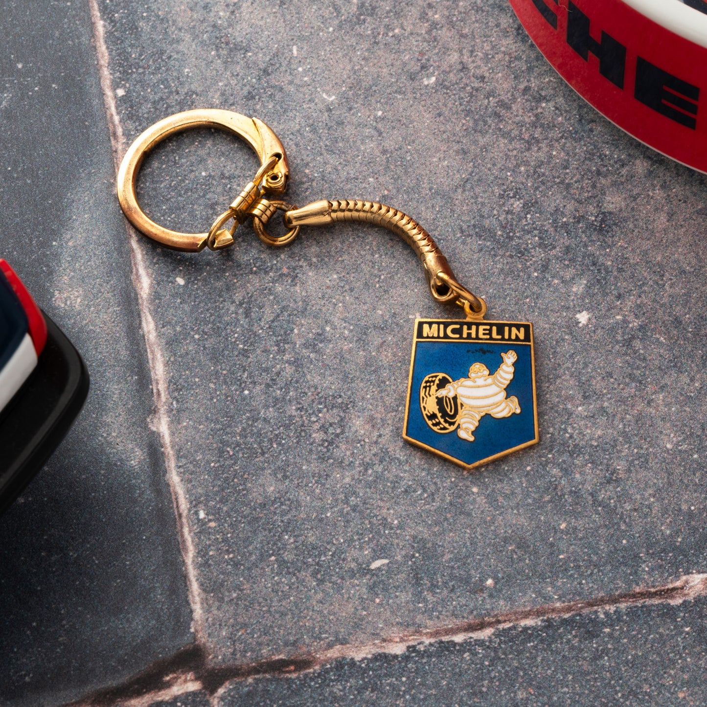 Michelin 'Bibendum' Shield Keychain - Brass & Enamel