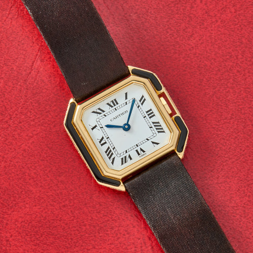 25 mm Cartier Paris Ceinture with onyx inlaid into the octagonal bezel, white Paris Roman dial and blued hands, the onyx-and-diamond version. · Photo: Analog:Shift · © Analog:Shift, used with permission · Source: https://www.analogshift.com/products/cartier-ceinture-paris-onyx-diamond-as11235