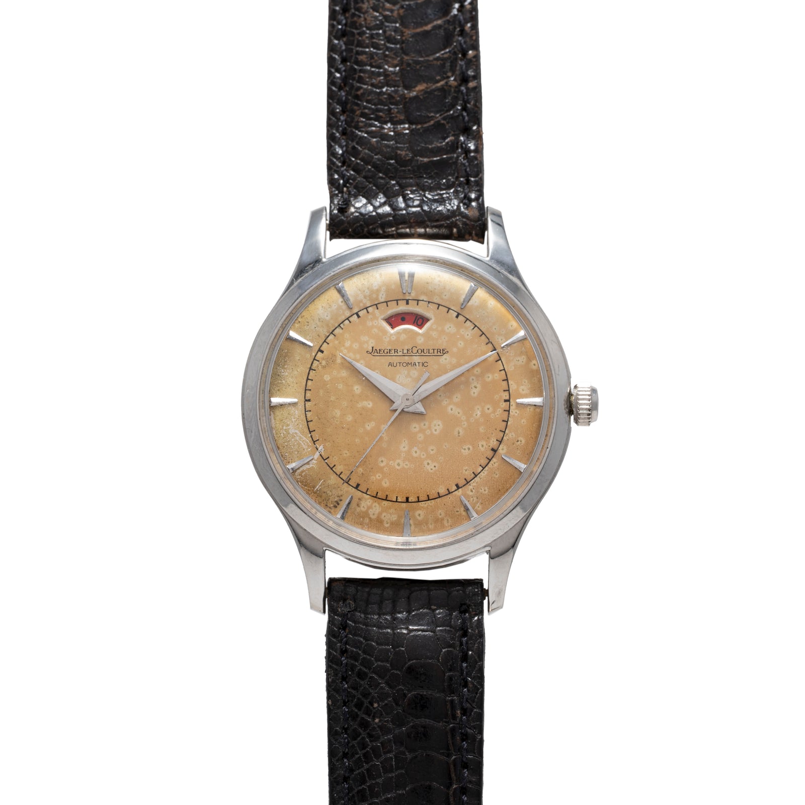 The Jaeger-LeCoultre 'European Market' Powermatic is a vintage wristwatch featuring a light brown speckled dial, silver markers and hands, and a textured black leather strap—a classic midcentury dress watch.