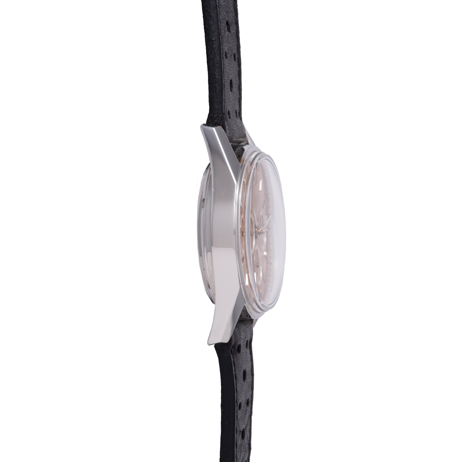 Side view of a TAG Heuer 1964 Carrera Re-Edition chronograph featuring a silver case, light dial, and black perforated leather strap, set against a white background.