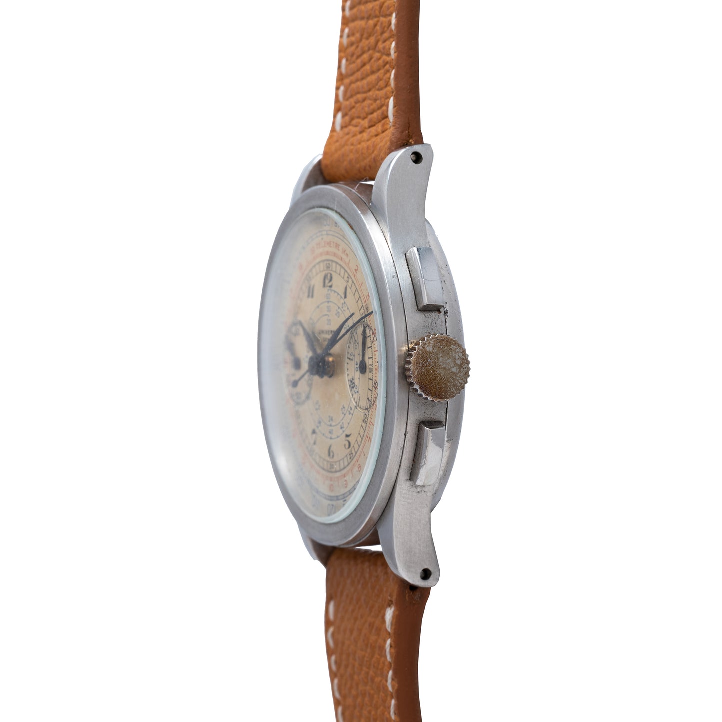 Side view of a Universal Geneve Compax 'Breguet' vintage chronograph with a round cream dial, stainless steel case, and tan leather strap, highlighting the crown and dial details against a white background.