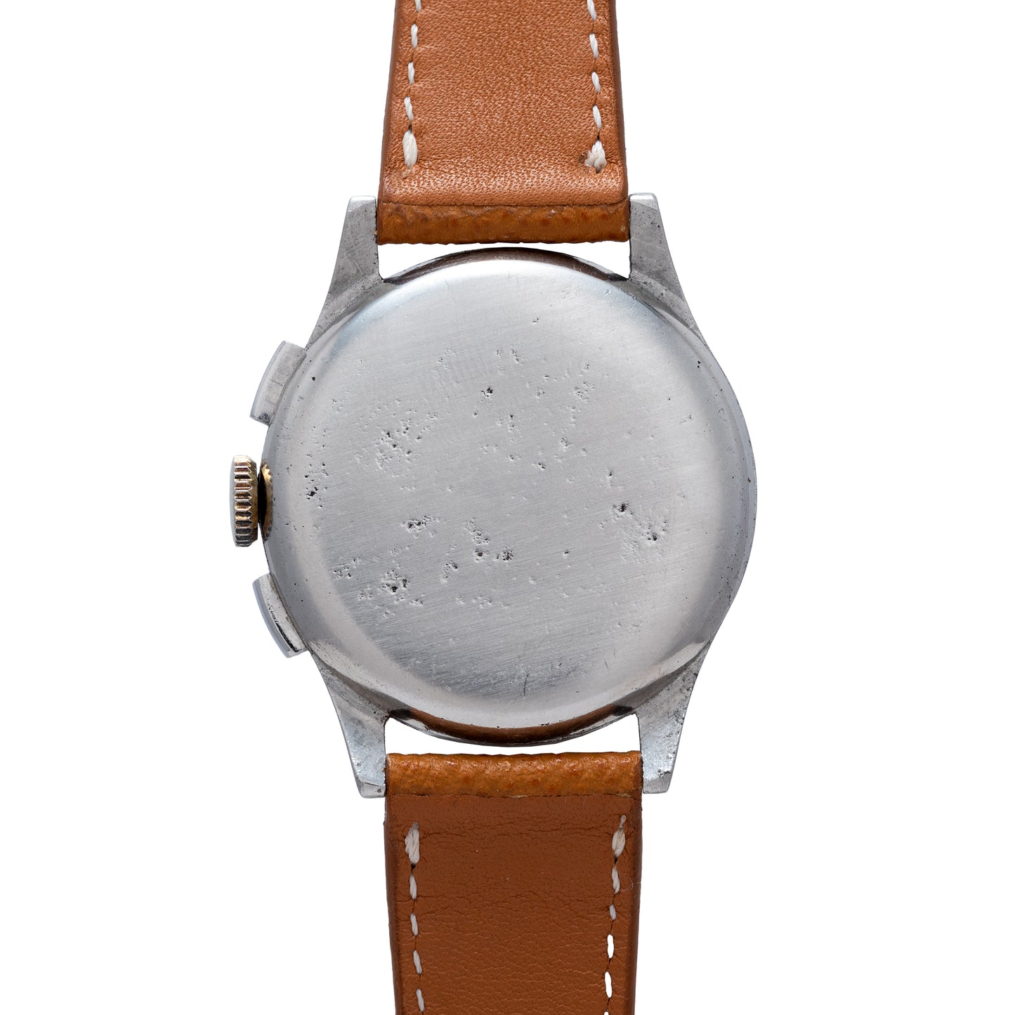 A close-up of the Universal Geneve Compax 'Breguet' shows a round stainless steel case with visible wear, paired with a brown leather strap with white stitching. The crown and pushers appear on the left side.