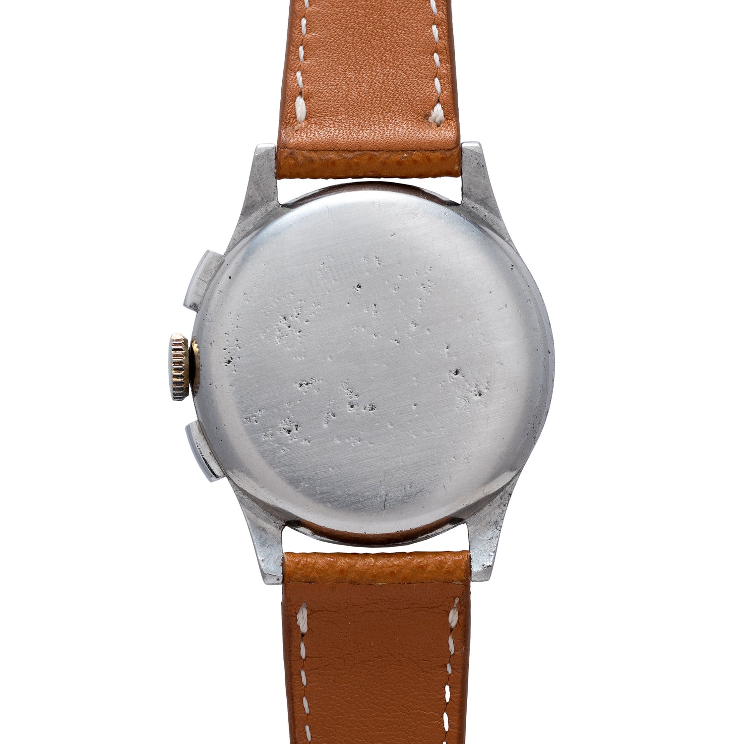 A close-up of the Universal Geneve Compax 'Breguet' shows a round stainless steel case with visible wear, paired with a brown leather strap with white stitching. The crown and pushers appear on the left side.