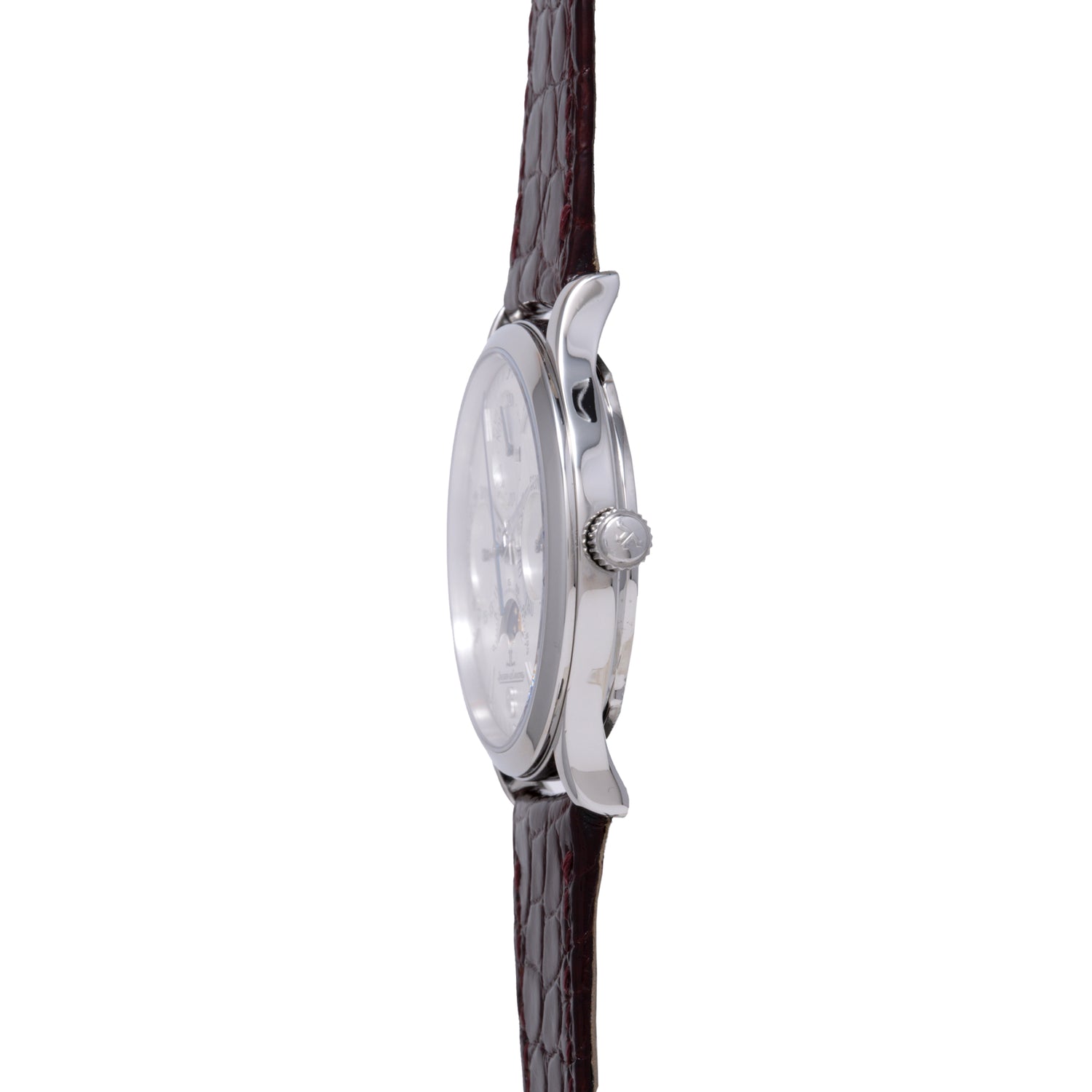 Side view of the Jaeger LeCoultre Master Control Perpetual Calendar, featuring a silver case, round crown, and dark brown textured leather strap—showcasing its slim profile and vintage-inspired polished metal edge.