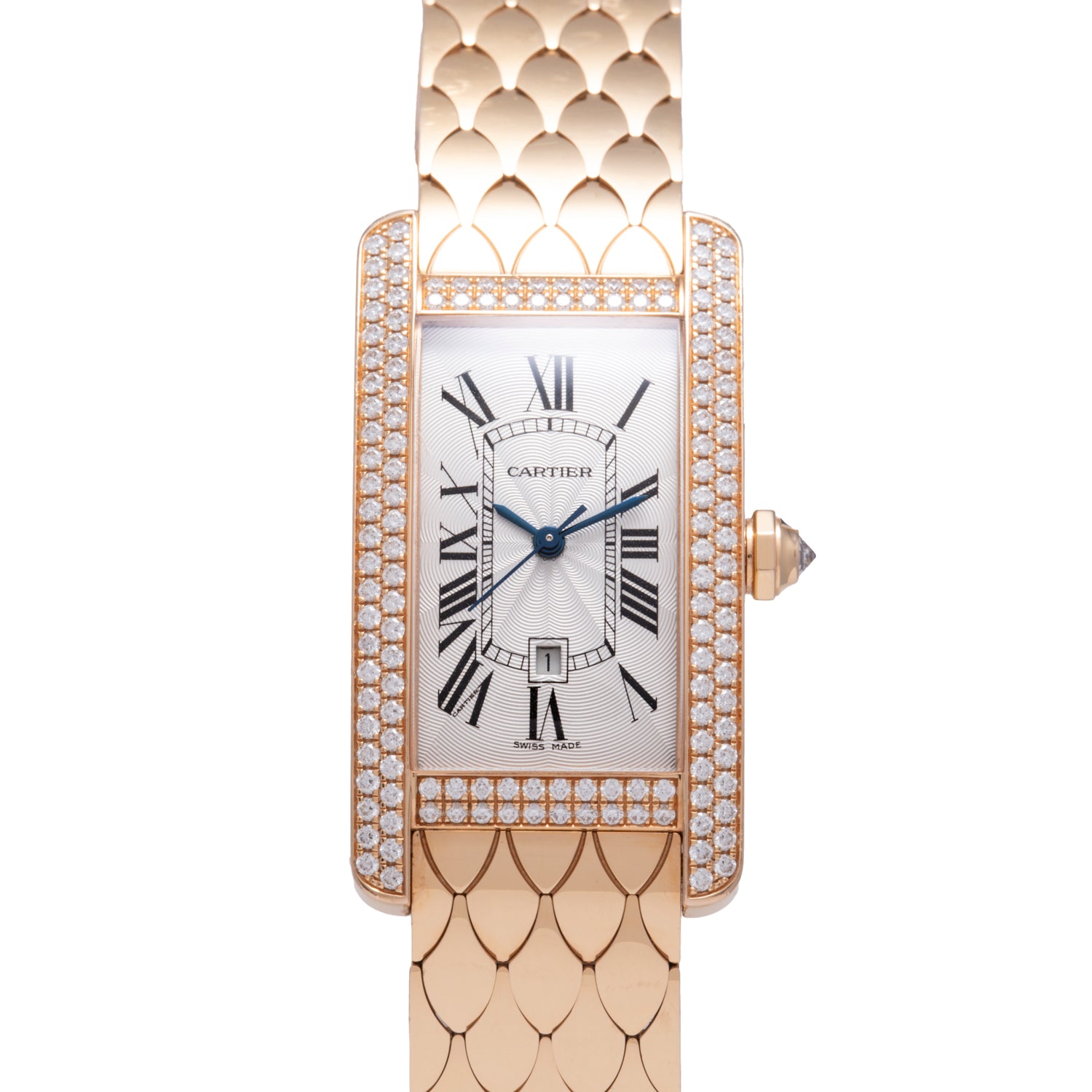 The Cartier Tank Americaine Automatic Diamonds features an 18K rose gold, scale-patterned band, diamond-set bezel, Roman numeral markers, blue hands, and a date window on a white dial.