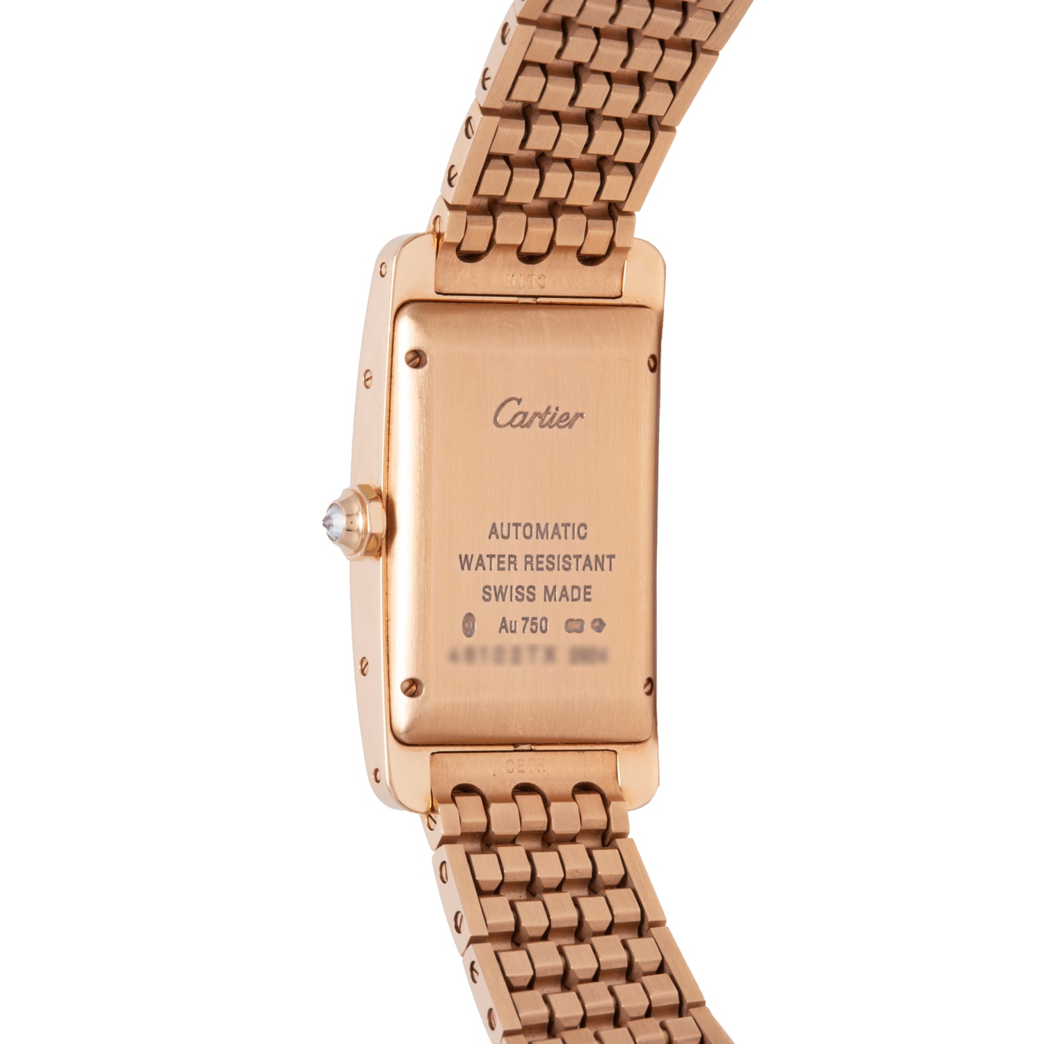 The back of a Cartier Tank Americaine Automatic Diamonds watch in 18K rose gold with a metal link band, engraved with Cartier, Automatic, Water Resistant, Swiss Made, and AU 750.