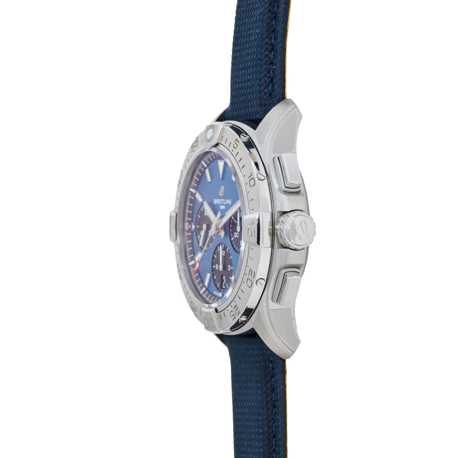A side view of the Breitling Avenger B01 Chronograph 42 watch features a blue dial, silver bezel, and blue strap, highlighting the crown and polished case details.