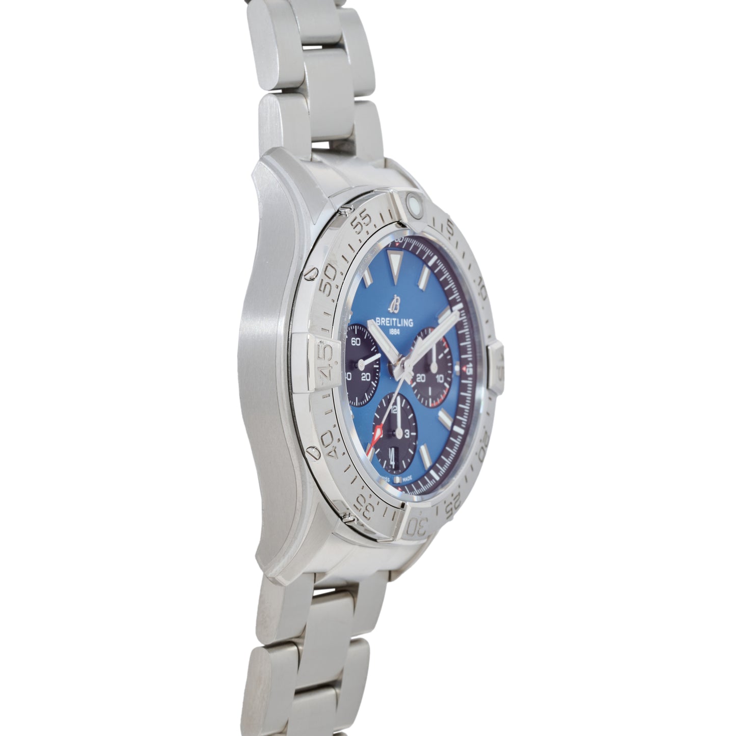 The Breitling Avenger B01 Chronograph 42 wristwatch by Breitling features a silver case, metal band, blue dial, and three subdials, shown at an angle to display its detailed side and face as a precision aviation watch.