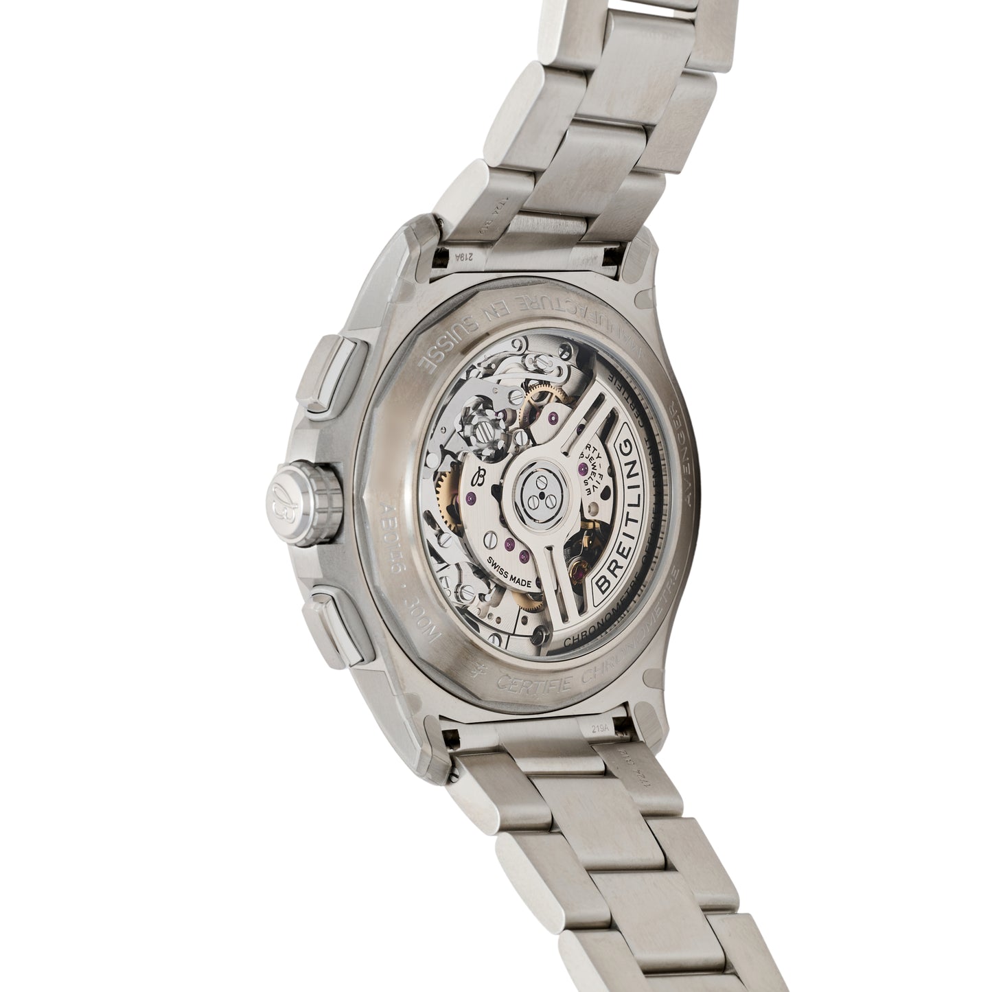 A close-up of the Breitling Avenger B01 Chronograph 42 displays its COSC-certified automatic movement and engraved details through a transparent case back, paired with a stainless steel bracelet.