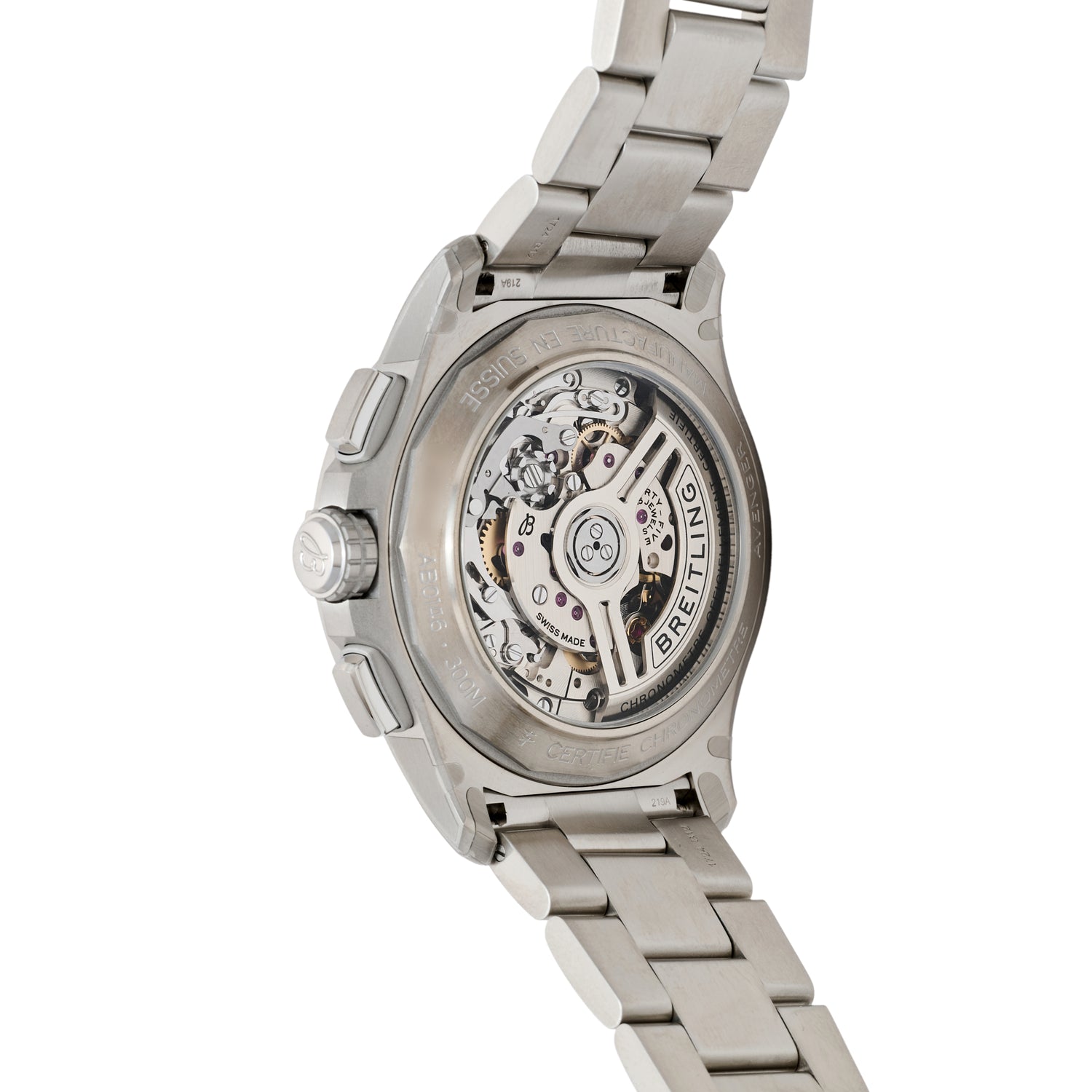 A close-up of the Breitling Avenger B01 Chronograph 42 displays its COSC-certified automatic movement and engraved details through a transparent case back, paired with a stainless steel bracelet.