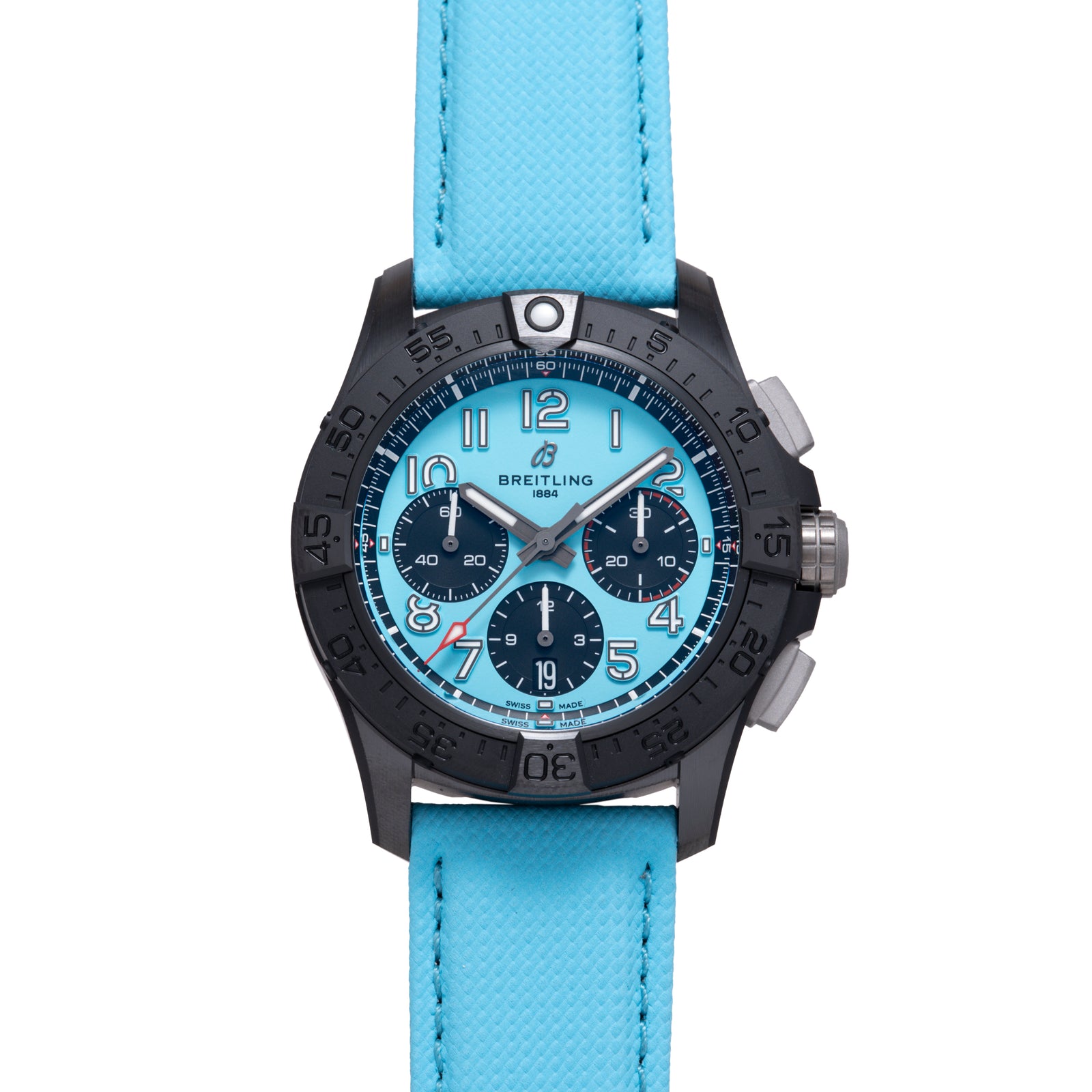 The Breitling Super Avenger B01 Chronograph 42 features a light blue strap, black bezel, and light blue dial with three dark blue subdials and silver hour markers, embodying the bold spirit of an aviation chronograph. Displayed on white.