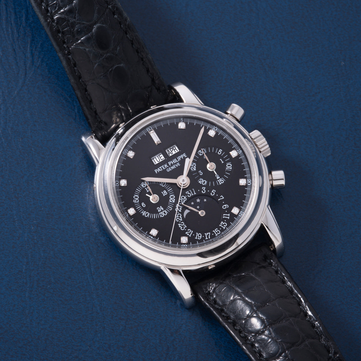 Silver-tone watch with black dial, multiple subdials, diamond hour markers, chronograph pushers, and black crocodile leather 