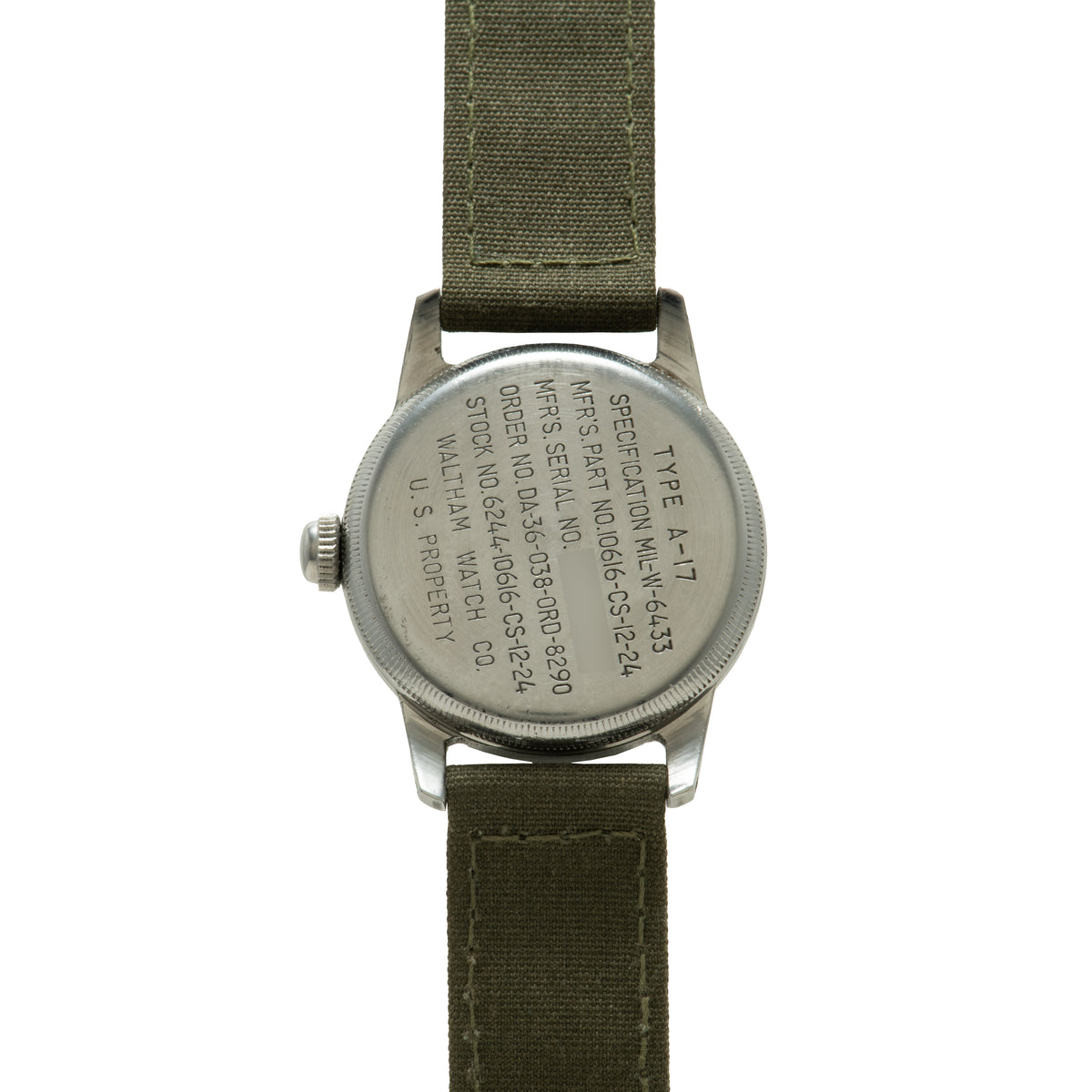 Waltham A-17 watch with olive green fabric strap and engraved stainless steel case back.