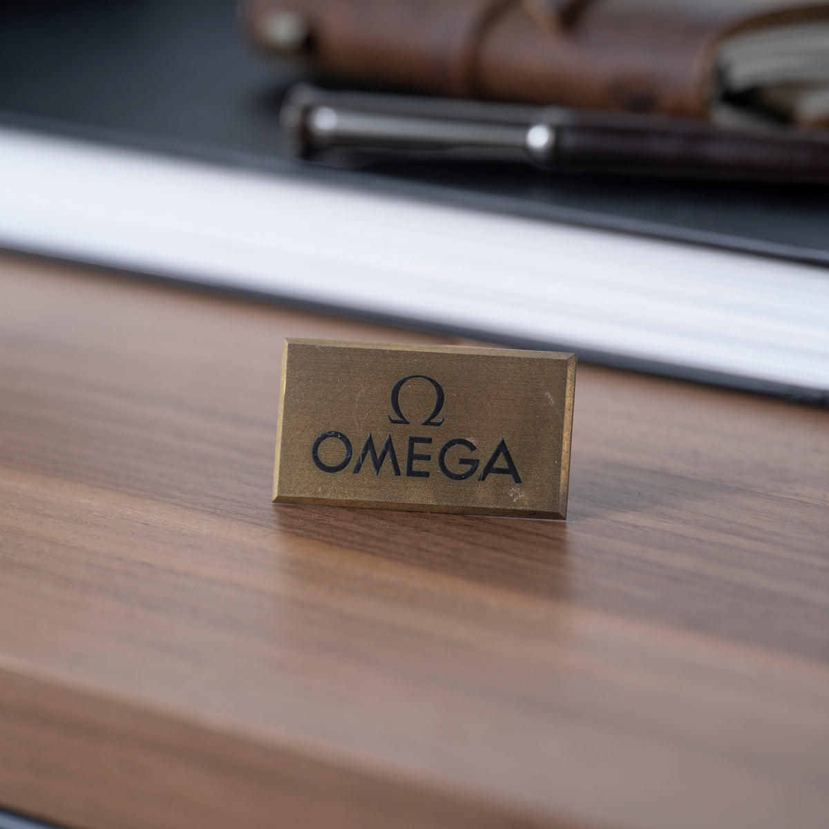 Omega Brass Signage