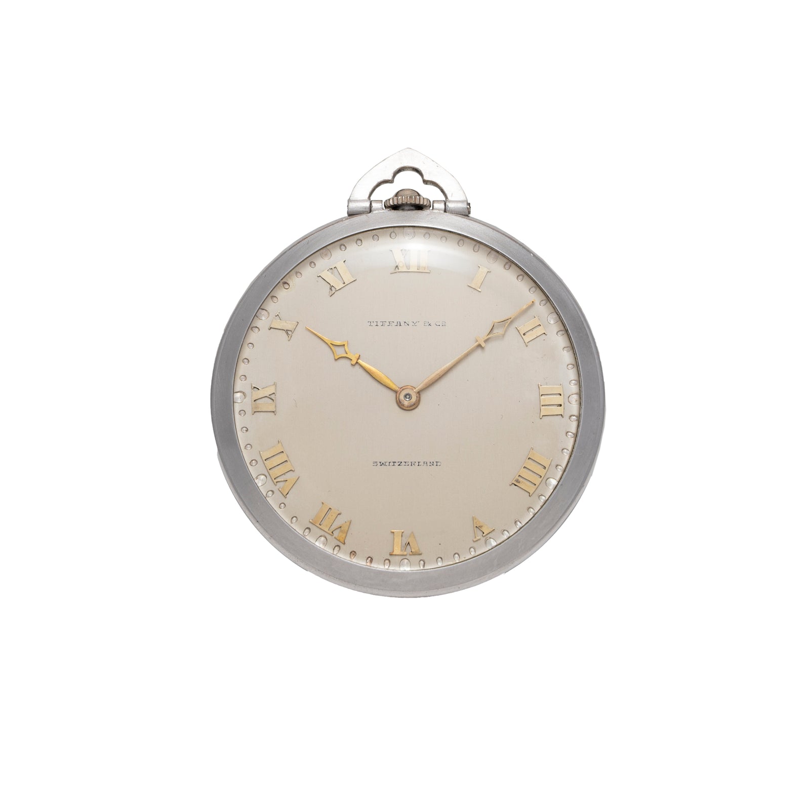 A vintage Tiffany & Co. Platinum Pocket Watch with platinum case, gold Roman numeral hour markers, and gold hands, displayed against a plain white background.