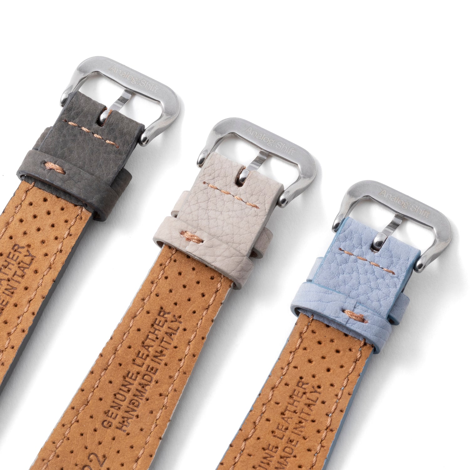 Three Analog:Shift Vantage Grey Matte Calf Leather Straps in vintage style are displayed side by side on a white background. Each handmade strap has visible stitching and “Genuine Leather” on the inside.