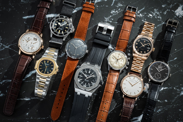 Group of vintage watches on marble