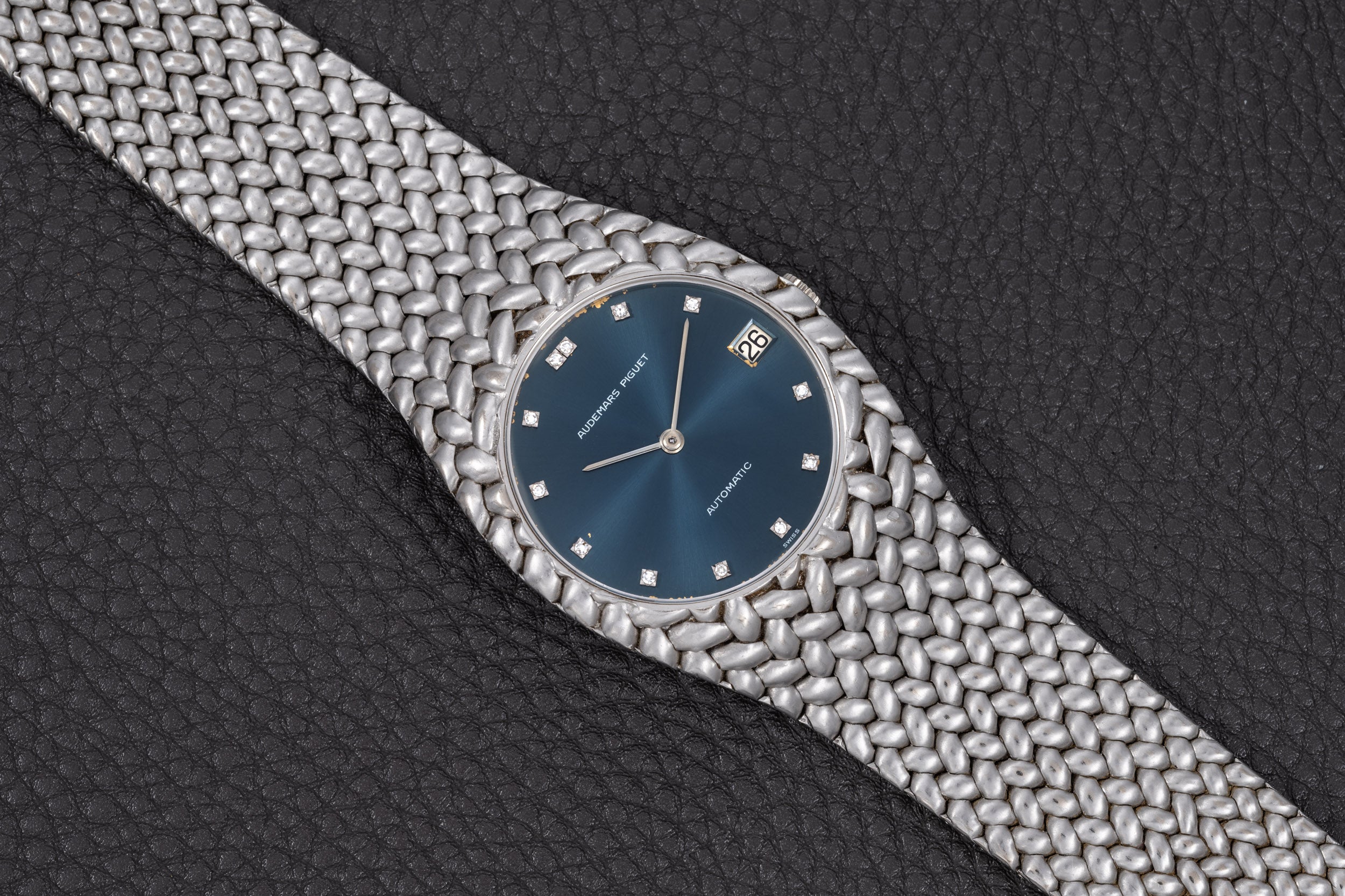 white gold dress watch Audemars Piguet Ultra Thin Dress Watch in 18kt White Gold Silver Diamond Markers Dial