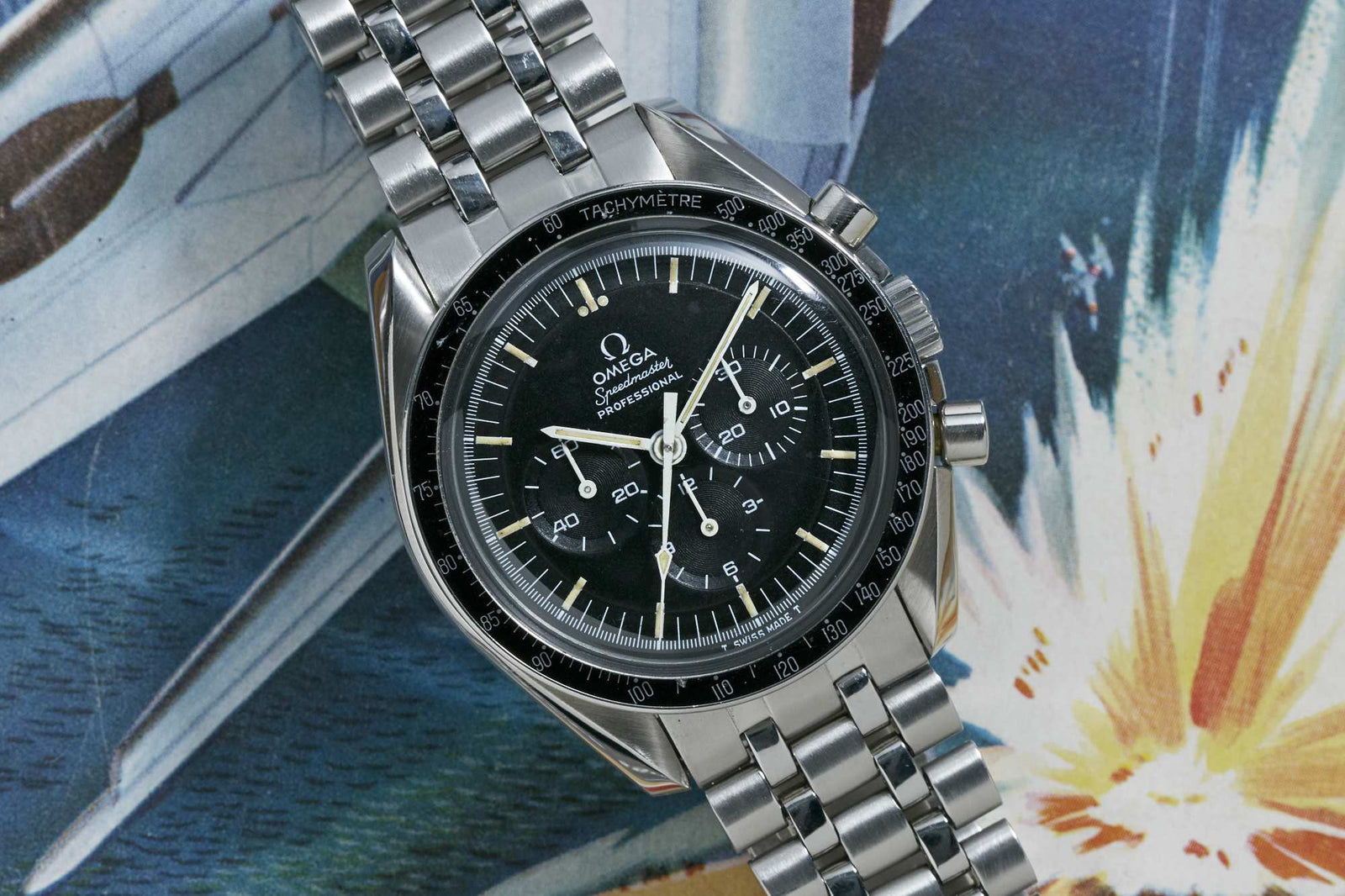 An Omega Speedmaster Professional wristwatch by Omega, featuring a black dial and chronograph functions, is set against a vibrant retro space-themed background. Detailed description coming soon!.